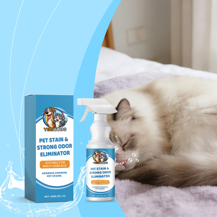 Pet stain spray next to a cat sleeping on a bed
